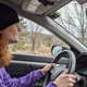 A photo of someone driving a Honda CR-V SUV